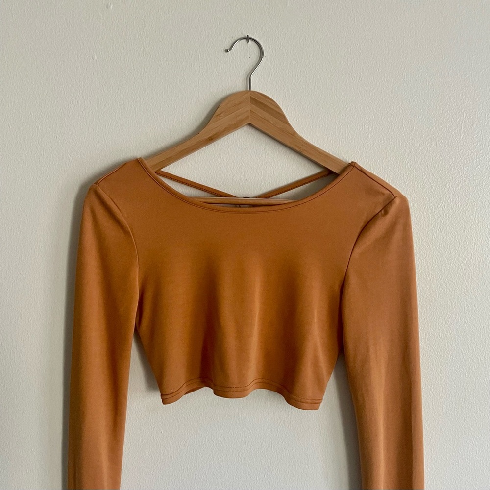 Somedays Lovin long sleeve crop top with cross back, burnt orange.